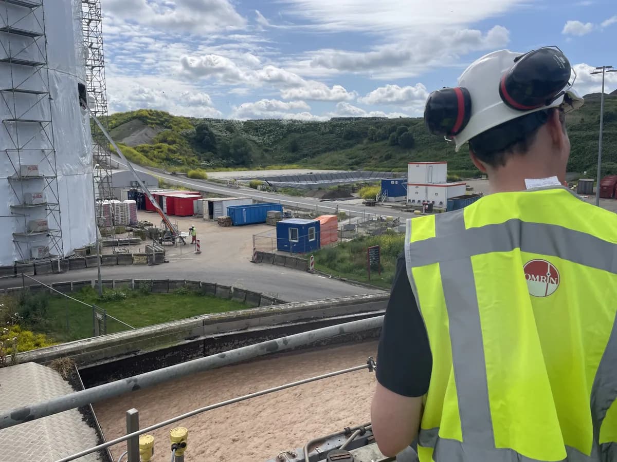 Researchable engineer surveying a partner's site