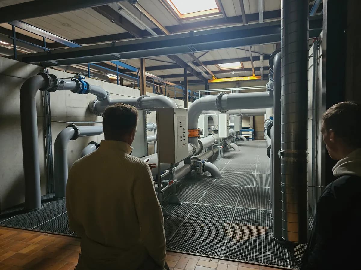 Two Researchable engineers inspecting an installation at a partner